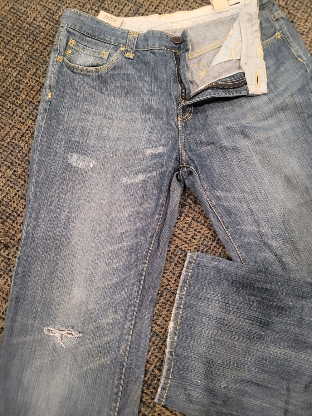 Seven7 Light Blue Flare Jeans with Subtle Distressing